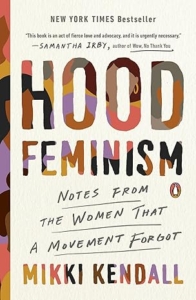 Book cover of “Hood Feminism: Notes from the Women That a Movement Forgot” by Mikki Kendall. The cover features bold black lettering on a white background with “HOOD” in vivid red, symbolizing urgency and power, reflecting the book’s unapologetic call for intersectional justice.